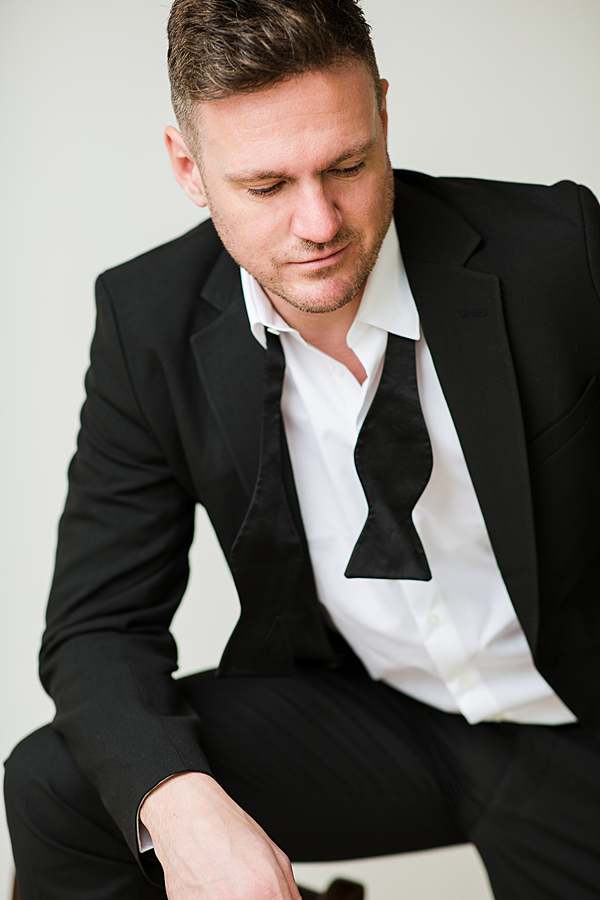 portrait-photography-london-man-in-open-tux-suit-looking-away