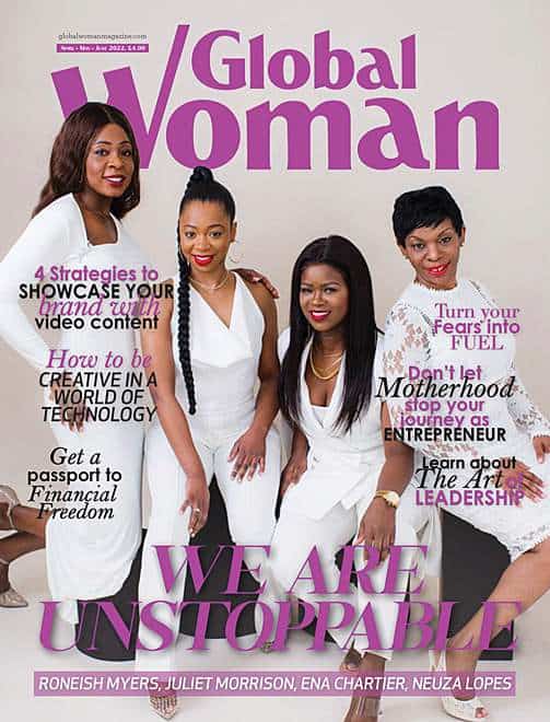 A professional corporate group portrait of four confident women dressed in elegant white outfits, featured on the cover of Global Woman magazine. They pose together in a dynamic and empowering stance, exuding leadership and success.